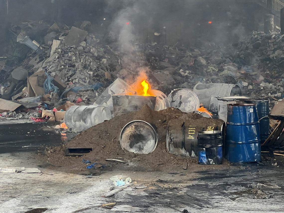 Barrels allegedly containing powdered aluminum and magnesium burn at a waste facility in Riverbank, CA on March 27, 2025
