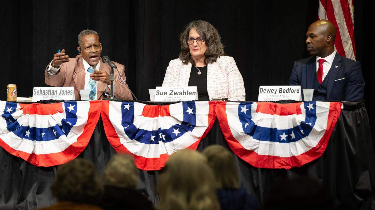 Modesto mayoral candidate Sebastian Jones, left, Modesto mayor Sue Zwhalen, and challenger Dewey Bedford, right, discuss city issues during a NAACP 2024 candidates forum at Modesto Centre Plaza in Modesto, Calif., Thursday, Feb. 22, 2024.