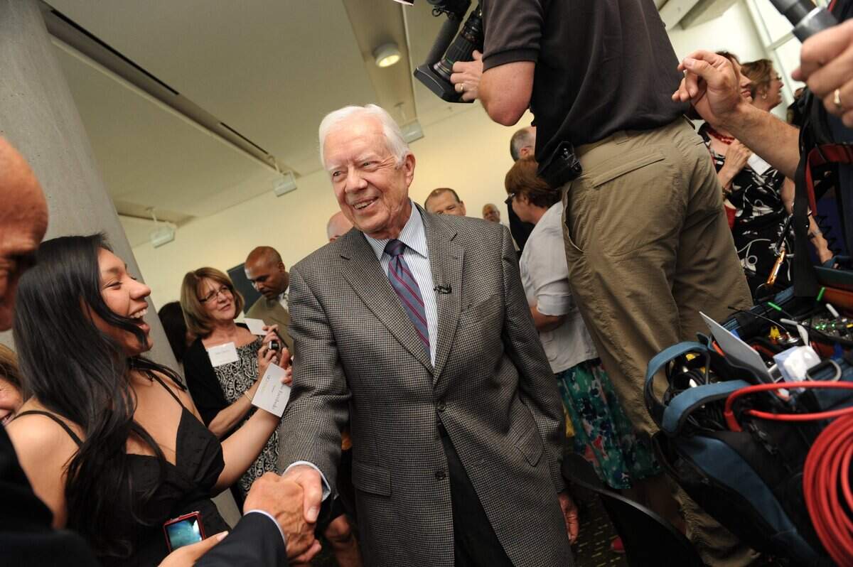 Former President Jimmy Carter visits UC Merced to receive the 2010 Alice and Clifford Spendlove Prize in Social Justice, Diplomacy and Tolerance in Merced, Calif. Monday, May 3, 2010. To his left UC Merced student Darlene Escobedo, 21.