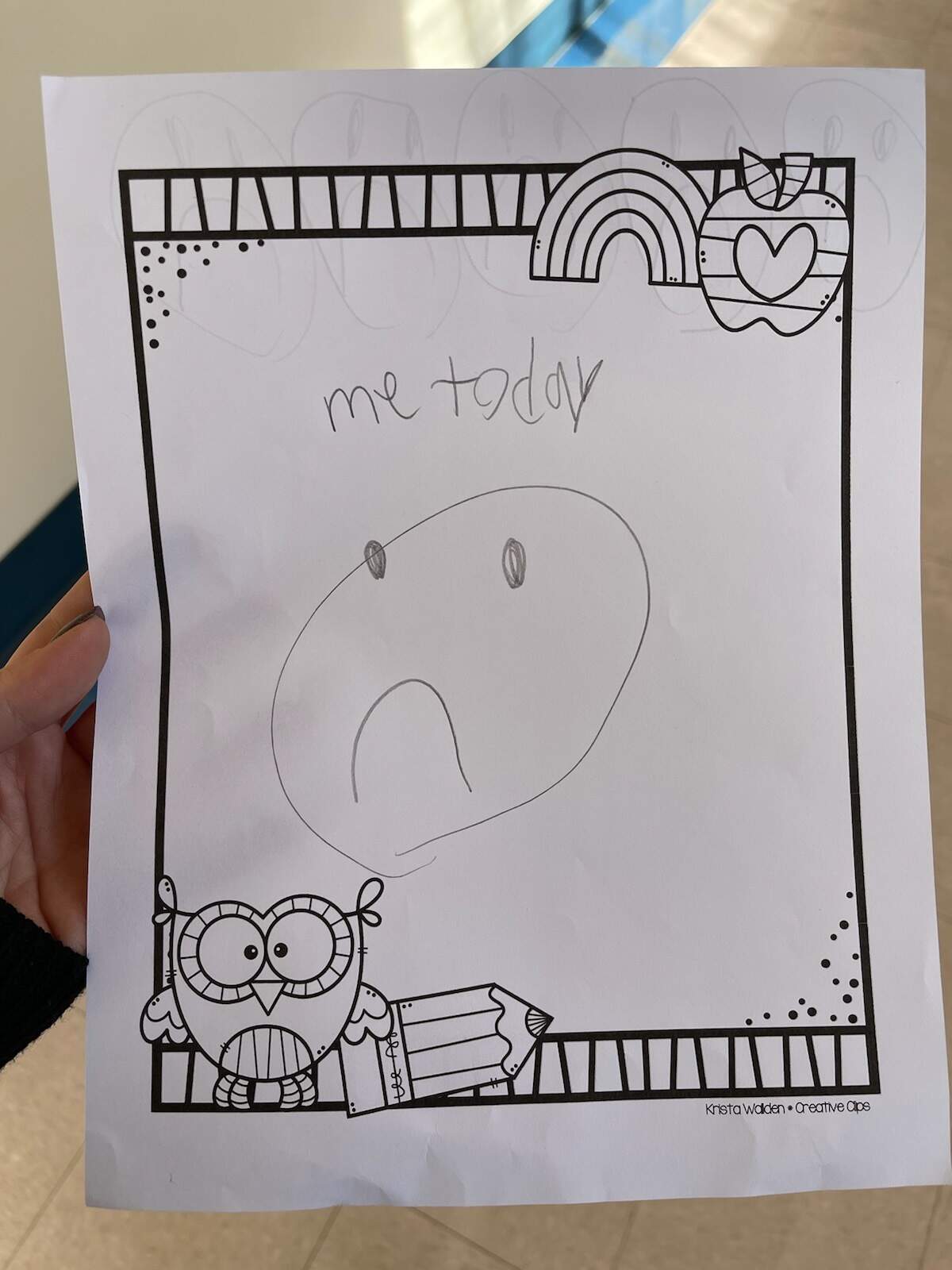 A first grader drew this picture of a frown while protesting, according to Superintendent Dave Kline.
