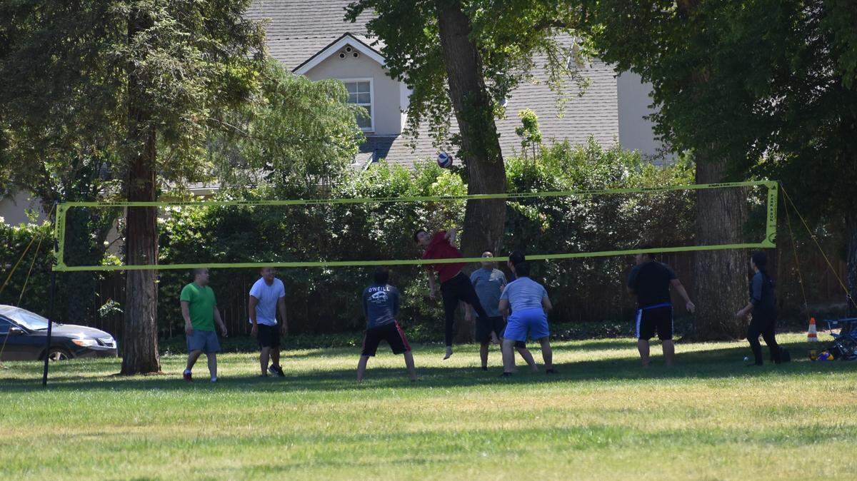 A group plays volleyball in Modesto’s Enslen Park on Sunday, May 3, 2020, when the high temperature reached only the upper 70s. Friday, the National Weather Service says, the high will be in the mid-90s.