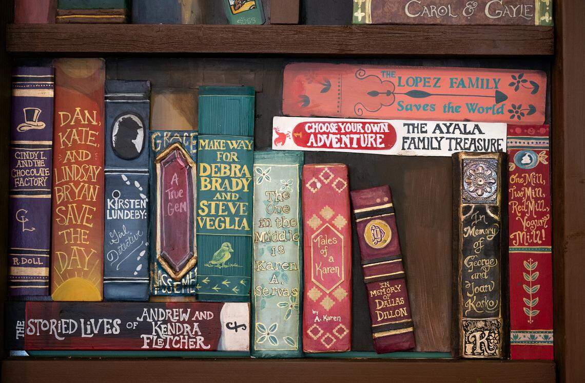 A detail of the faux bookcase at Bookish honoring Modesto and community donors who helped get the bookshop started. Bookish bookstore in Roseburg Square in Modesto, Calif., Tuesday, April 4, 2024.