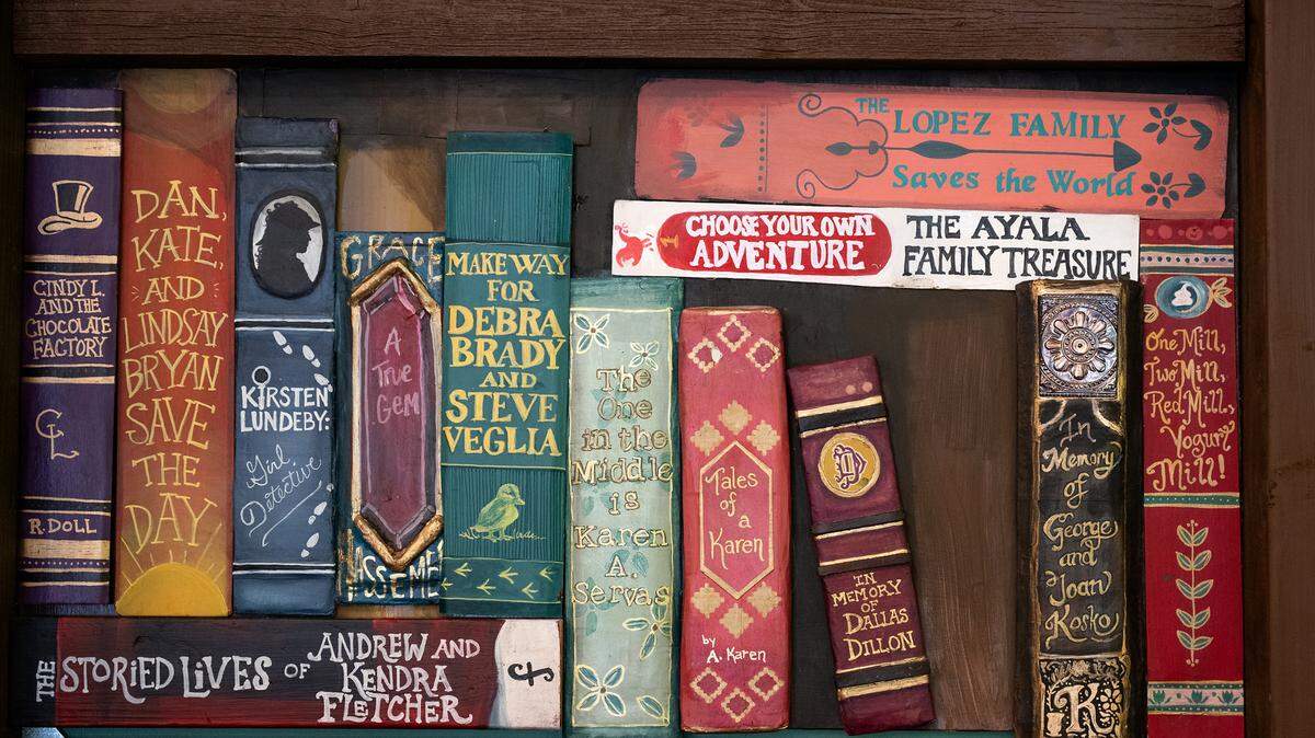 A detail of the faux bookcase made by artist Randi Ocena at Bookish