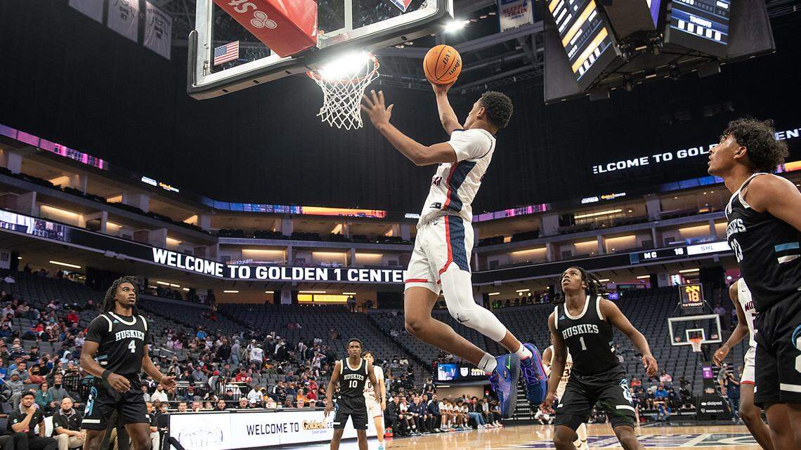 Modesto Christian’s Jamari Phillips scores two of his 22 points during the Sac-Joaquin Section Division 1 boys basketball final with Sheldon at the Golden 1 Center in Sacramento, Calif., on Saturday, Feb. 26, 2022. Modesto Christian won the game 52-42.