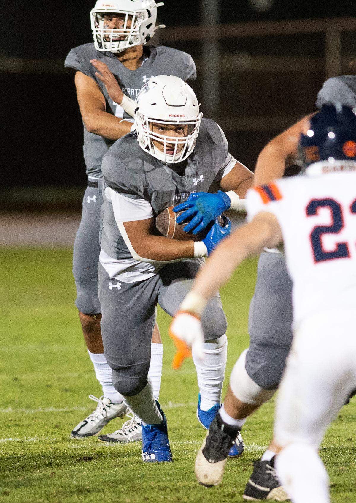 Modesto’s Aiden Taylor runs the ball during the game with College of the Sequoias at Modesto Junior College in Modesto, Calif., Saturday, Nov. 5, 2022.