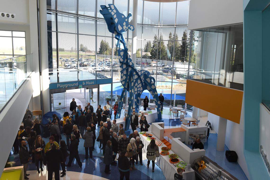 People tour the Pelandale Specialty Care Center during the grand opening Friday morning February 8, 2019 in Modesto, Calif. The 40,000 square foot state of the art medical facility will bring more pediatric specialists to the area including cardiology, neurology, gastroenterology and orthopaedics.
