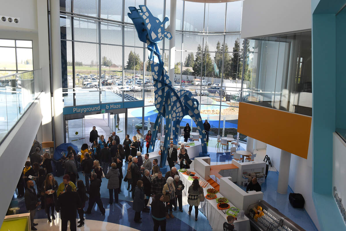 People tour the Pelandale Specialty Care Center during the grand opening Friday morning February 8, 2019 in Modesto, Calif. The 40,000 square foot state of the art medical facility will bring more pediatric specialists to the area including cardiology, neurology, gastroenterology and orthopaedics.