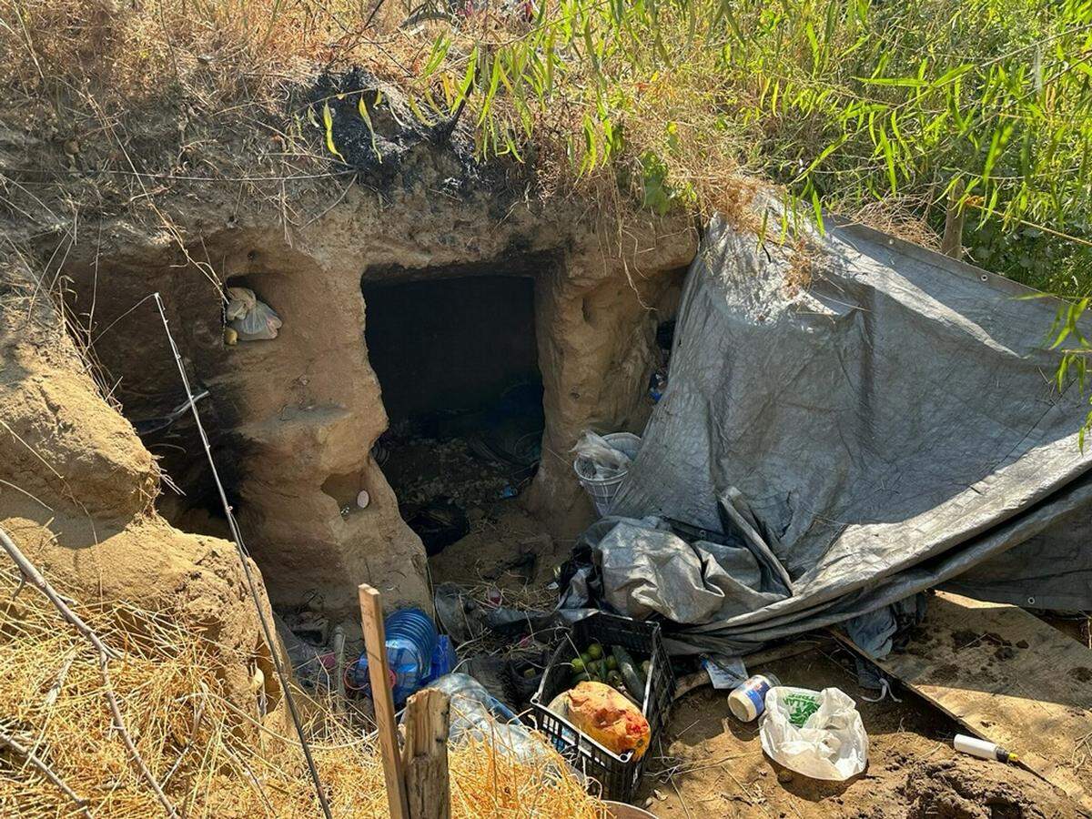 Two people suffered burns Sunday afternoon, Sept. 24, 2023, when they used gasoline to start a fire in a cave cut into the bank along the Tuolumne River at Crater Avenue in south Modesto.