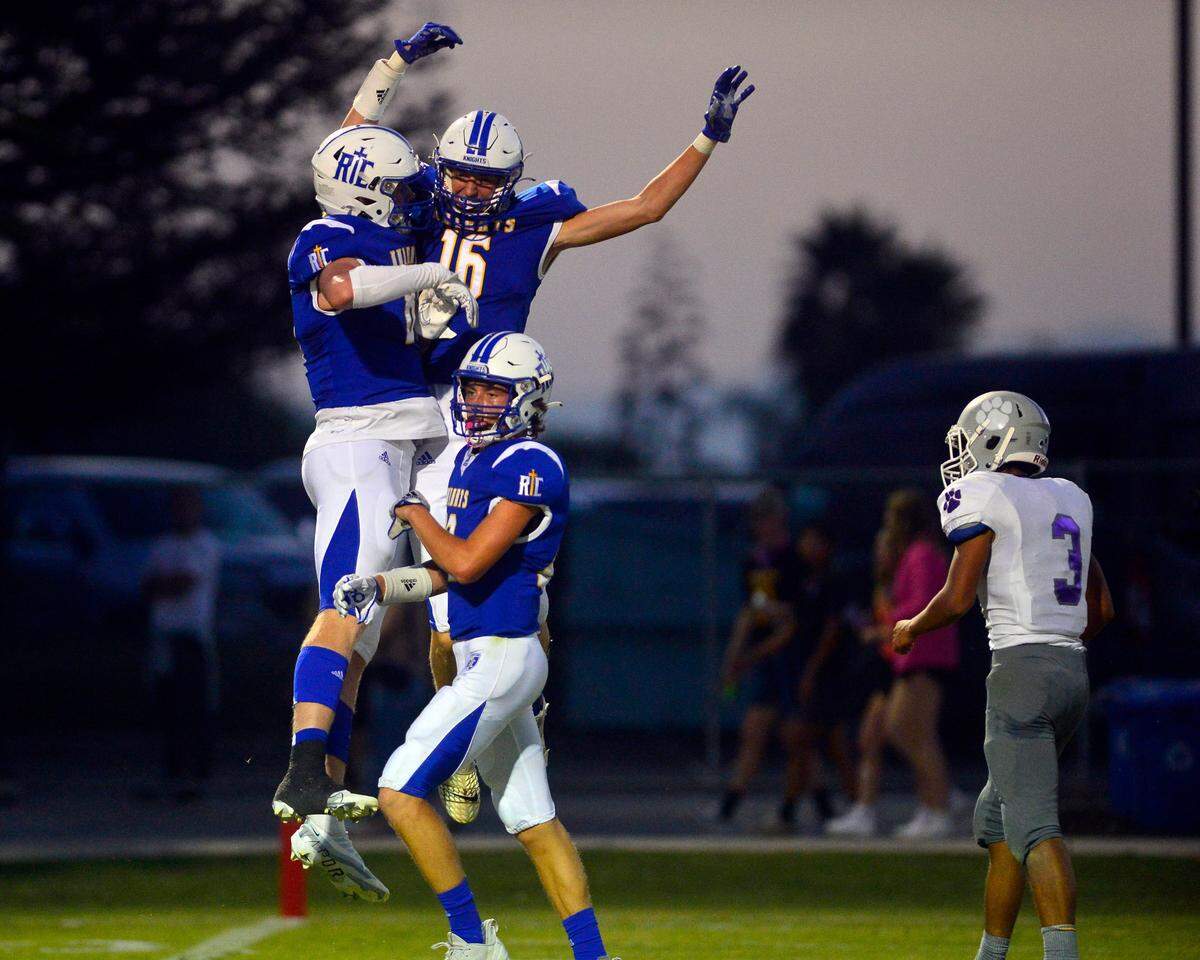 RC receivers Jace Beidleman and Thys Van Der Hoek celebrate a touchdown during a game between Ripon Christian and Denair at Ripon Christian High School in Ripon California on September 16, 2022.
