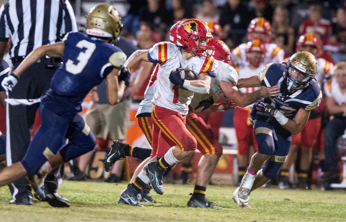 Oakdale’s Gabe McDonald carried the ball for 95 yards and scored the Mustangs’ only touchdown in the Valley Oak League game with Central Catholic in Modesto, Calif., Friday, Oct. 14, 2022.