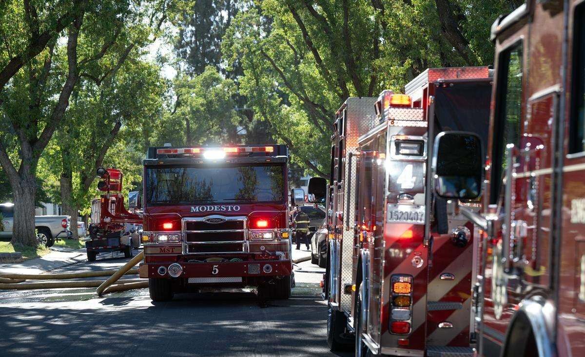 Modesto firefighters respond to a structure fire on Balboa Way in Modesto, Calif., Saturday, June 15, 2024.