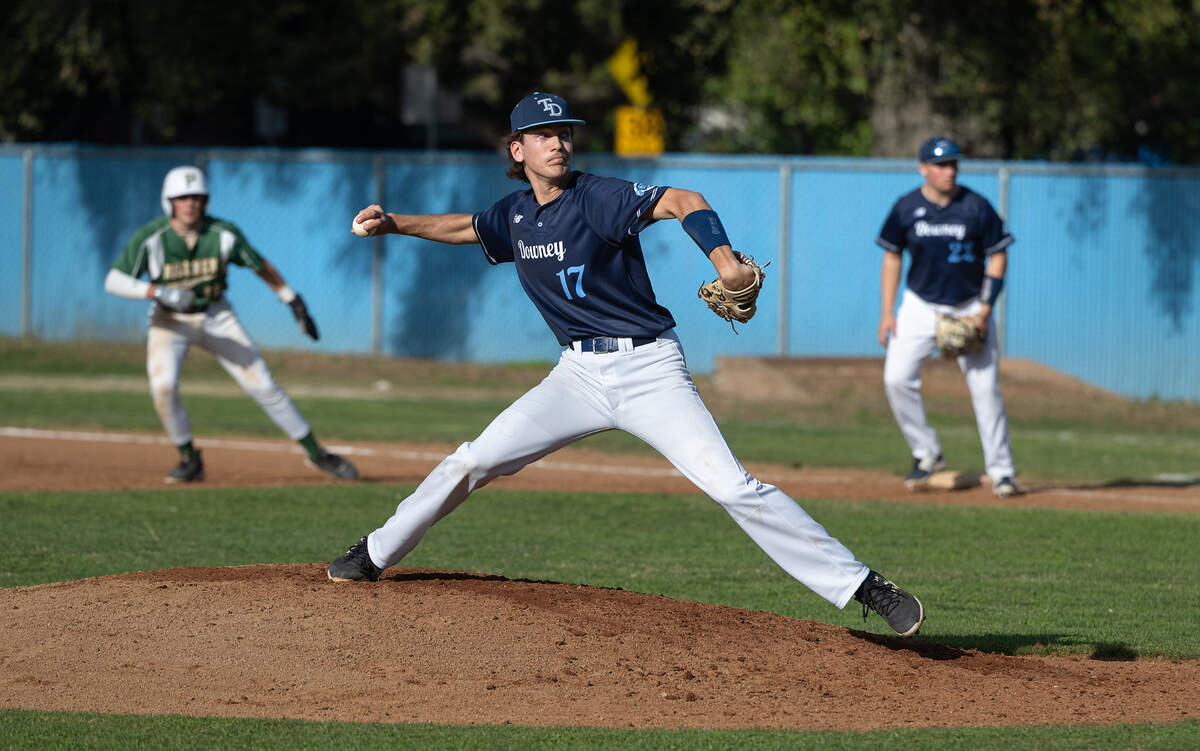 Downey ace Aiden Larson delivers a pitch during the March Madness baseball tournament game with Placer at Downey High School in Modesto, Calif., Friday, March 8, 2024.