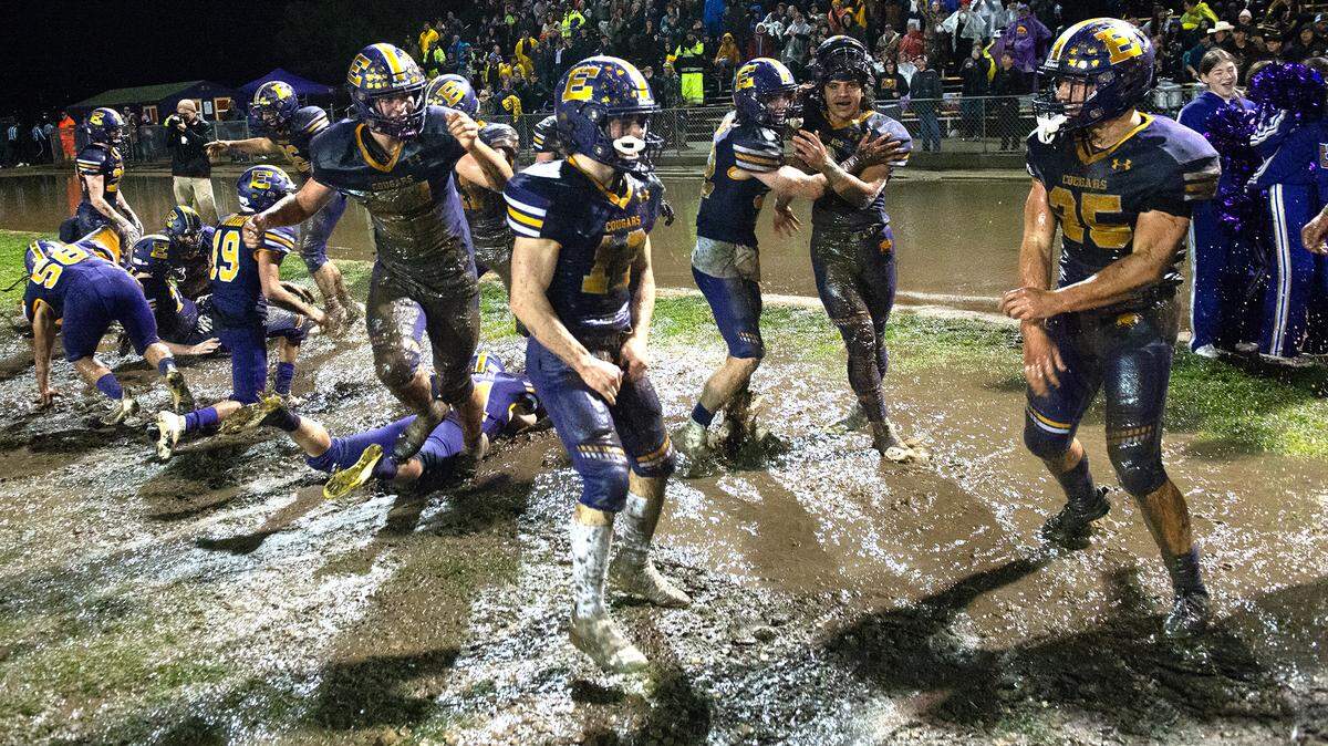 Escalon football players celebrate after capturing their second Division 4-AA state title in three years on Dec. 10, 2022.