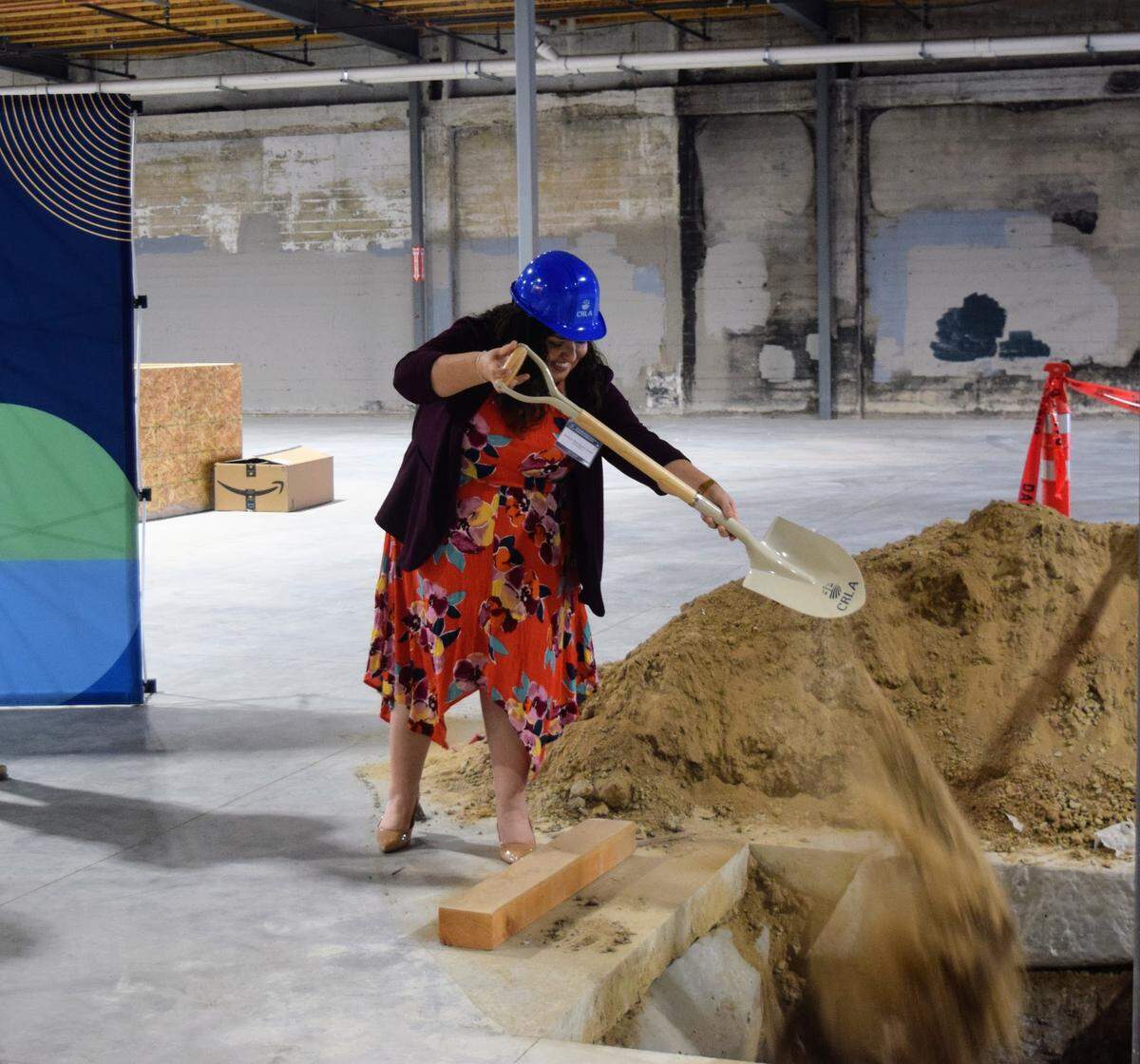 Jessica Manriquez Jewell, president and chief executive officer of California Rural Legal Assistance, shovels dirt to mark the start of construction of the new Modesto headquarters at the groundbreaking ceremony on June 5, 2025.
