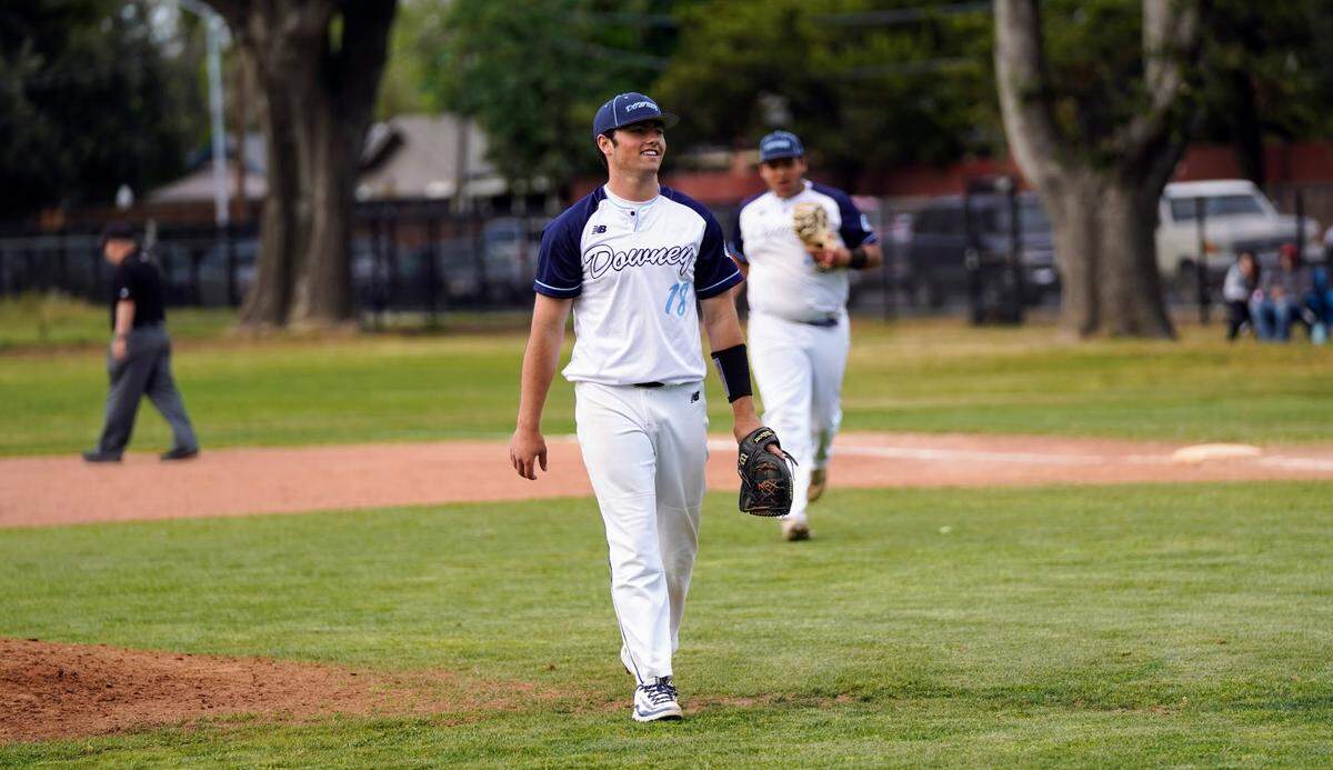 Downey’s Ryne Moore walks off the field after an inning during a CCAL game against Gregori High at Downey High School in Modesto, Calif. on Wednesday, April 16, 2025.