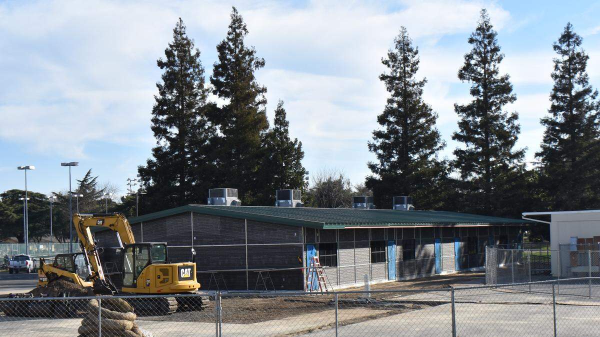 Construction continues Tuesday, March 2, 2021, on the Health Services Academy building at Davis High School in Modesto.