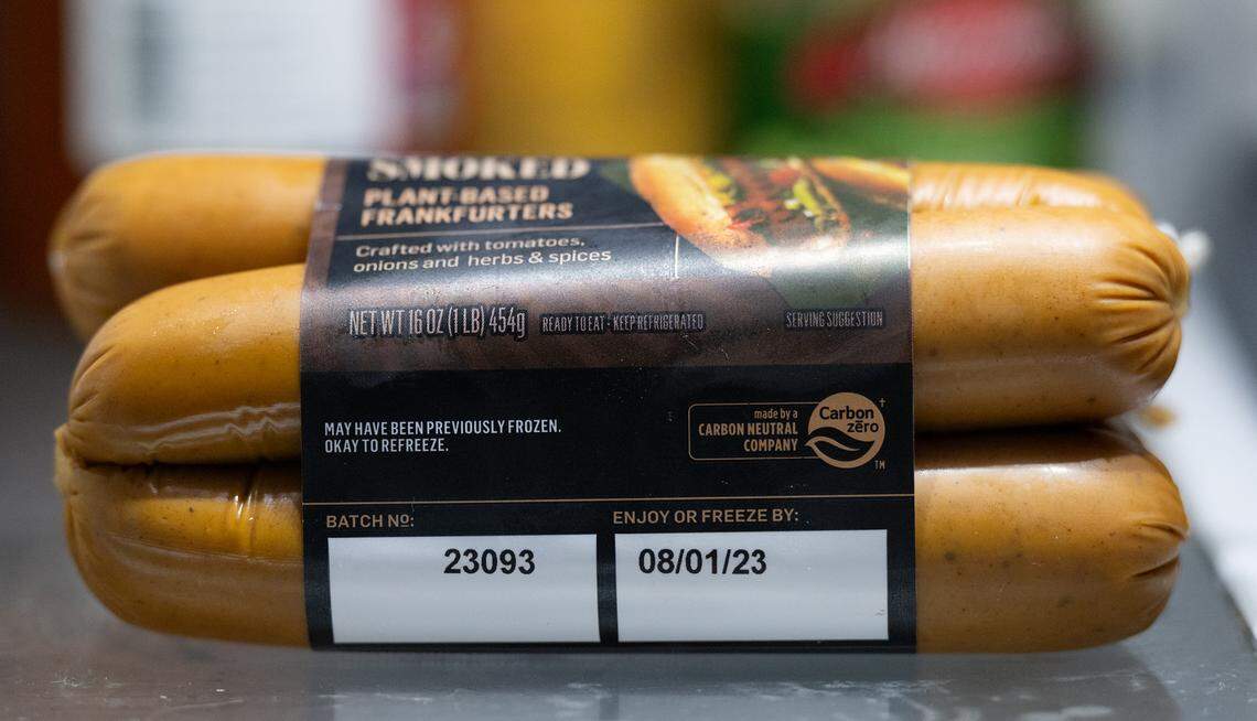 A “freeze by” food label on a package of plant-based frankfurters. 