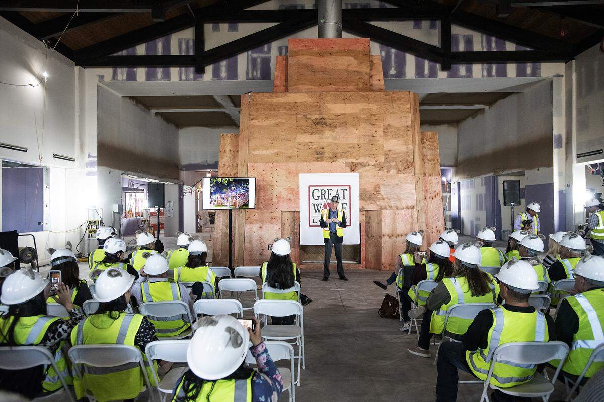 Murray Hennessy, CEO of Great Wolf Resorts Inc. talks to guests before a tour of the at the Great Wolf Lodge in Manteca, Calif., on Wednesday, March. 4, 2020.