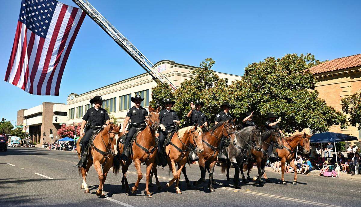 Members of the Modesto Police Deptartment Mounted Unit during the 152nd Annual Modesto Fourth of July Parade on Friday, July 4, 2025.