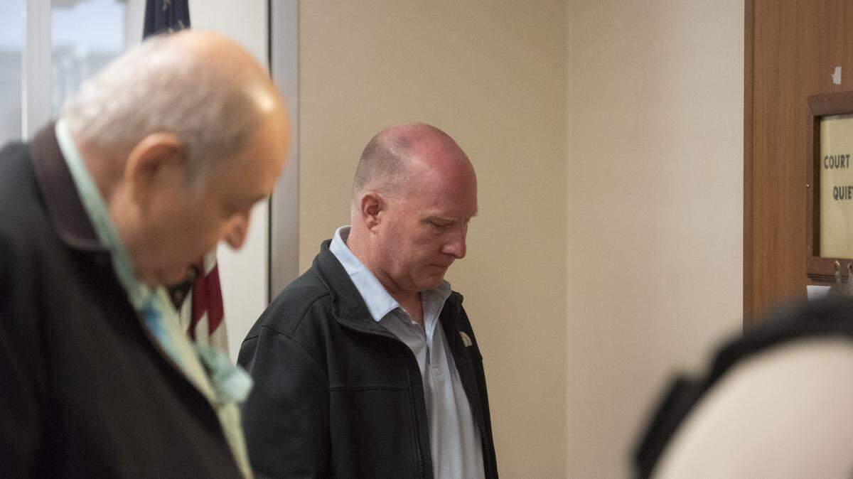 James Hooker outside Department 3 of Stanislaus County Superior Court before a hearing in Modesto on April 13, 2026. A judge postponed Hooker’s preliminary hearing to May 4 after his attorney cited illness.