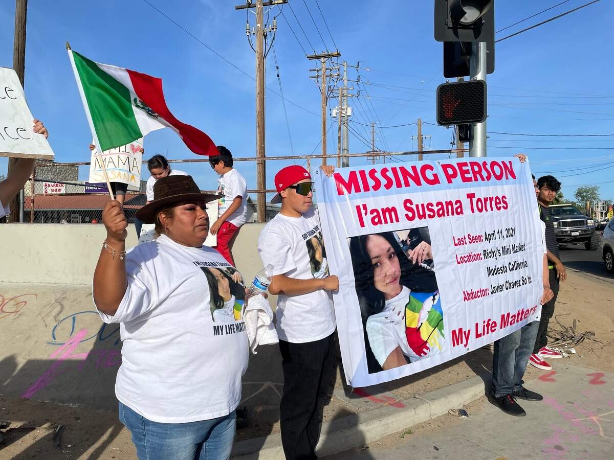 Family members of Susana Torres rally at Hatch and Crows Landing roads on April 10, 2022, to mark the one year anniversary of her disappearance. Torres was allegedly kidnapped by her estranged husband.