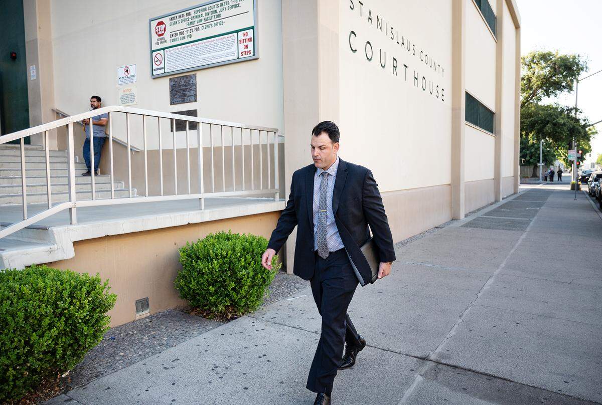 Former Modesto Police officer Joseph Lamantia makes his way to the Stanislaus County courthouse in Modesto, Calif., Friday, July 21, 2023. Judge Carrie Stephens cleared Lamantia in the fatal shooting of Trevor Seever.