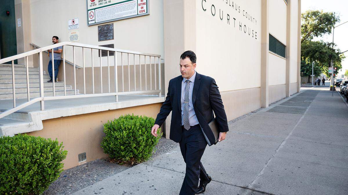 Former Modesto Police officer Joseph Lamantia makes his way to the Stanislaus County courthouse in Modesto, Calif., Friday, July 21, 2023. Judge Carrie Stephens cleared Lamantia in the fatal shooting of Trevor Seever.