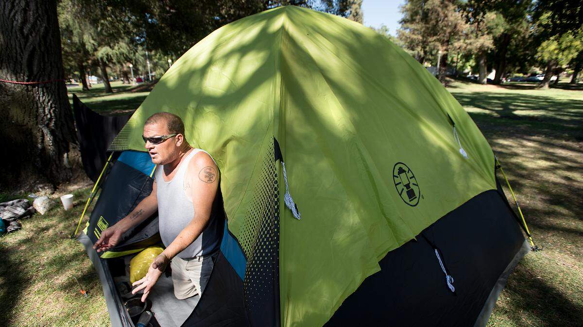 Homeless resident Robert Burgin was told by police to relocate his camp Graceada Park to Beard Brook Park. Photographed in Modesto , Calif., on Tuesday, Sept. 18, 2018. 