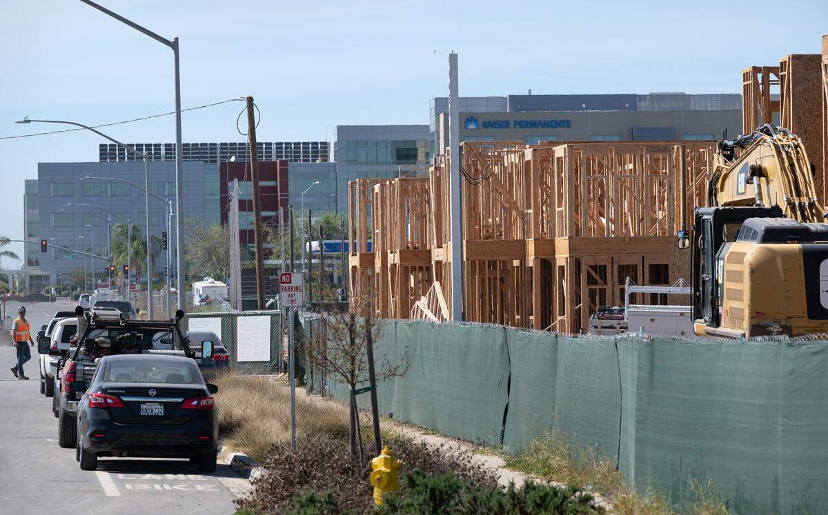 Construction of an apartment complex is underway across from Kaiser Medical Center on Dale Road in Modesto, Calif., on Thursday, March 24, 2022.
