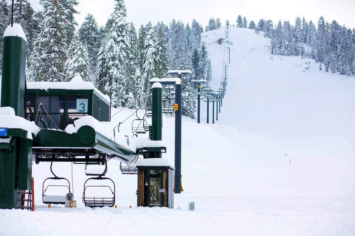 Heavy machinery prepares for the Nov. 11, 2022, opening of the Dodge Ridge ski area near Pinecrest CA.