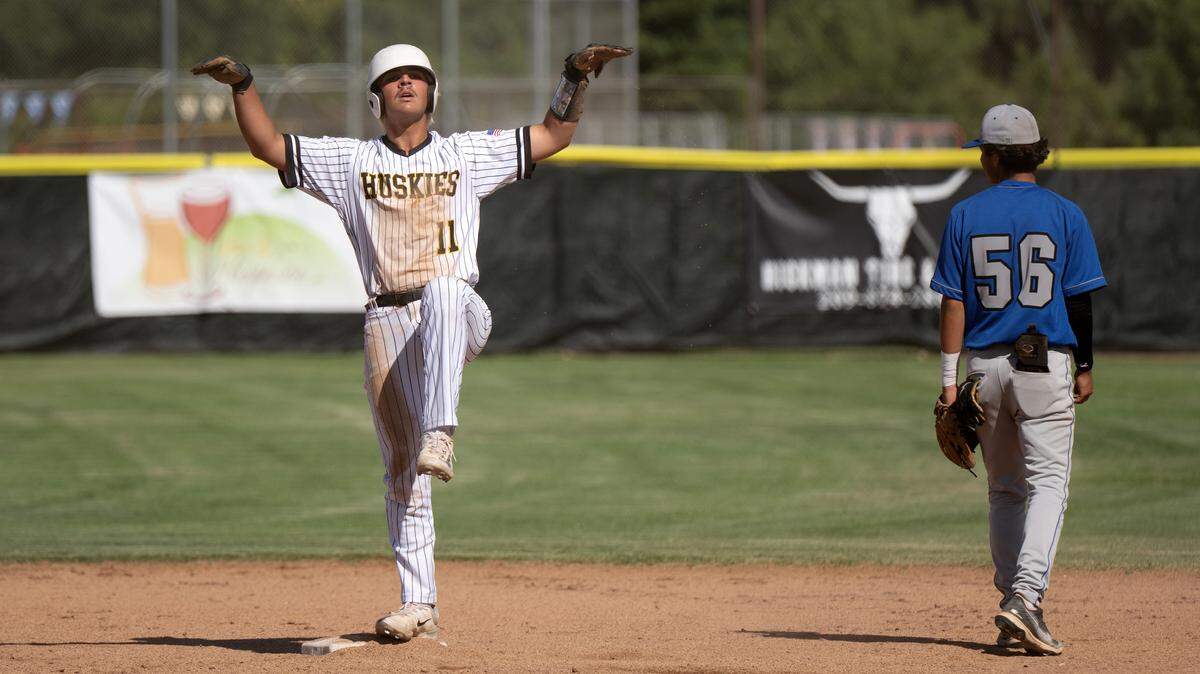 Hughson’s Benji Ocegueda celebrates a double during the Sac-Joaquin Section Division 5 semifinal playoff game with Wheatland at Hughson High School in Hughson, Thursday, May 15, 2025. Hughson won the series 2-1 with the 12-2 victory in game 3.
