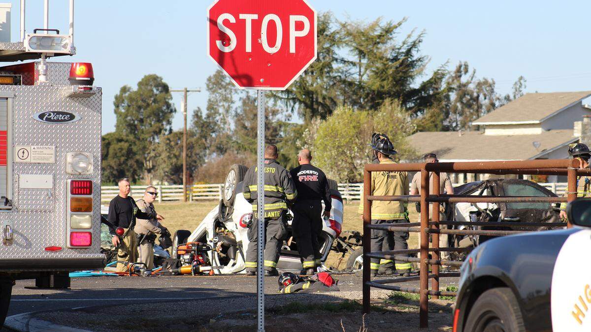 Authorities investigate a fatal crash at Bentley and Patterson roads between Riverbank and Oakdale, Calif., on Saturday, March 12, 2022.