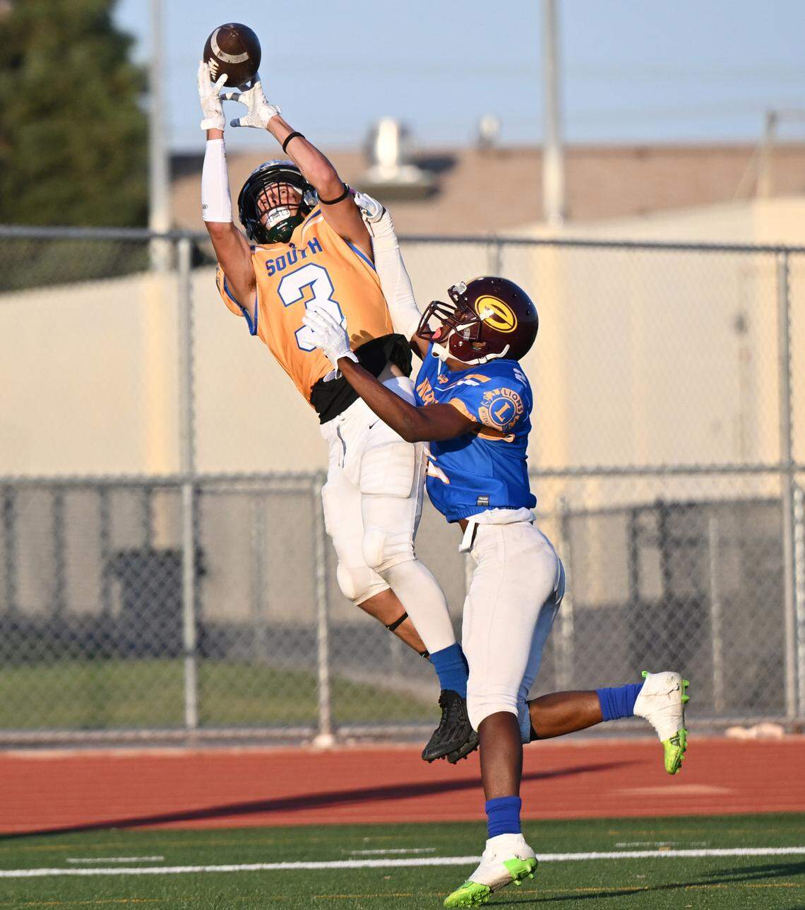 South team receiver Joey Stout (Pitman) makes a touchdown catch over the North’s Nadar Williams (Edison) during the Central California Lions All-Star Football Game at Tracy High School in Tracy, Calif., Saturday, June 24, 2023. The South won the game 38-13.