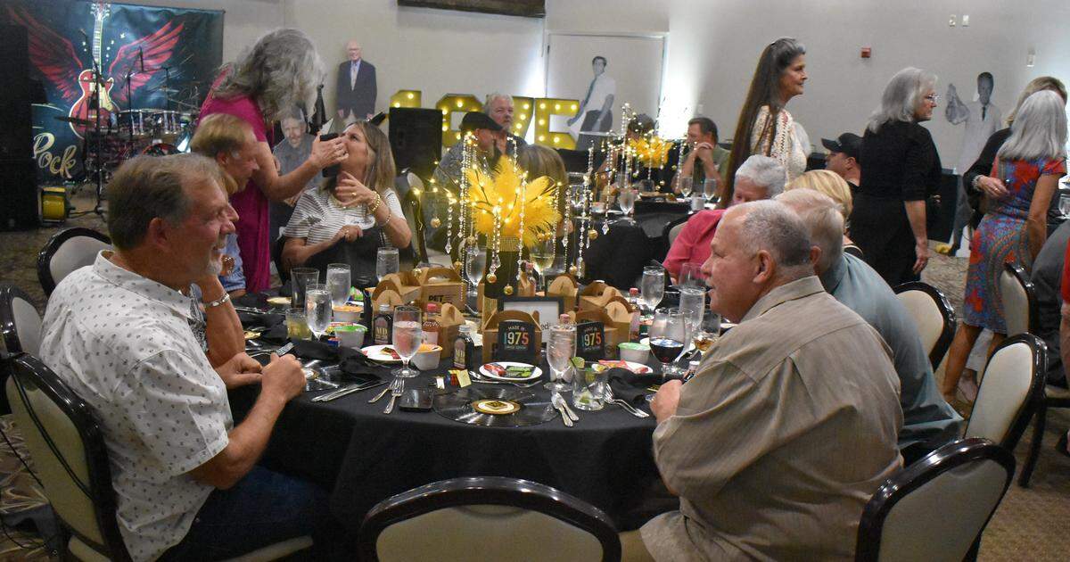 Beyer High School alumni socialize before dinner at the Class of 1975’s 50-year reunion at Del Rio Country Club north of Modesto on Saturday, Sept. 13, 2025.
