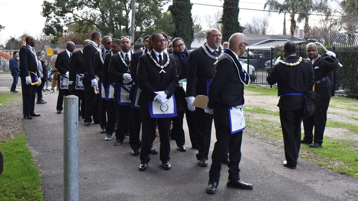 Masonic Lodge members and others assemble for the MLK Unity March on Monday afternoon, Jan. 16, 2023, on the Helen White Trail in Modesto.