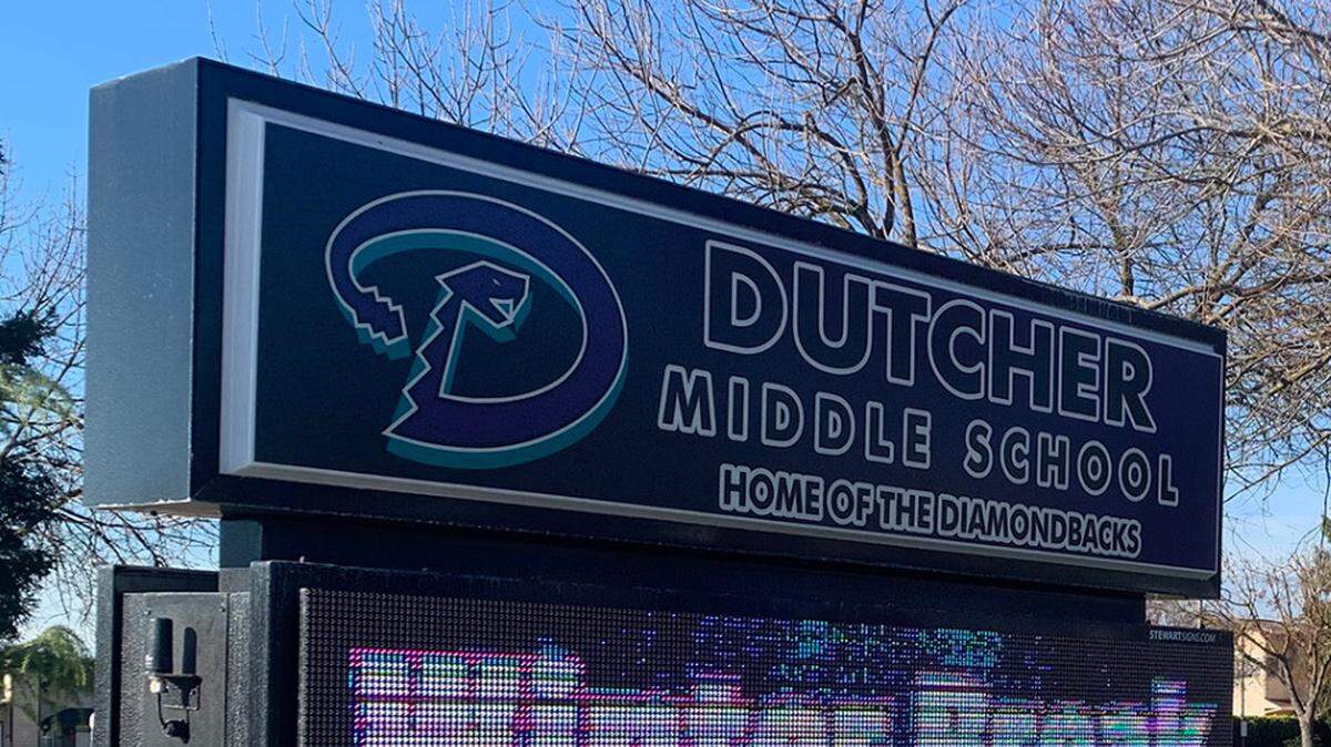 A Dutcher Middle School sign in Turlock, Calif., on Dec. 30 2021, shows winter break ends Jan. 2. Turlock Unified School District plans to continue in-person learning with COVID-19 safety protocols.