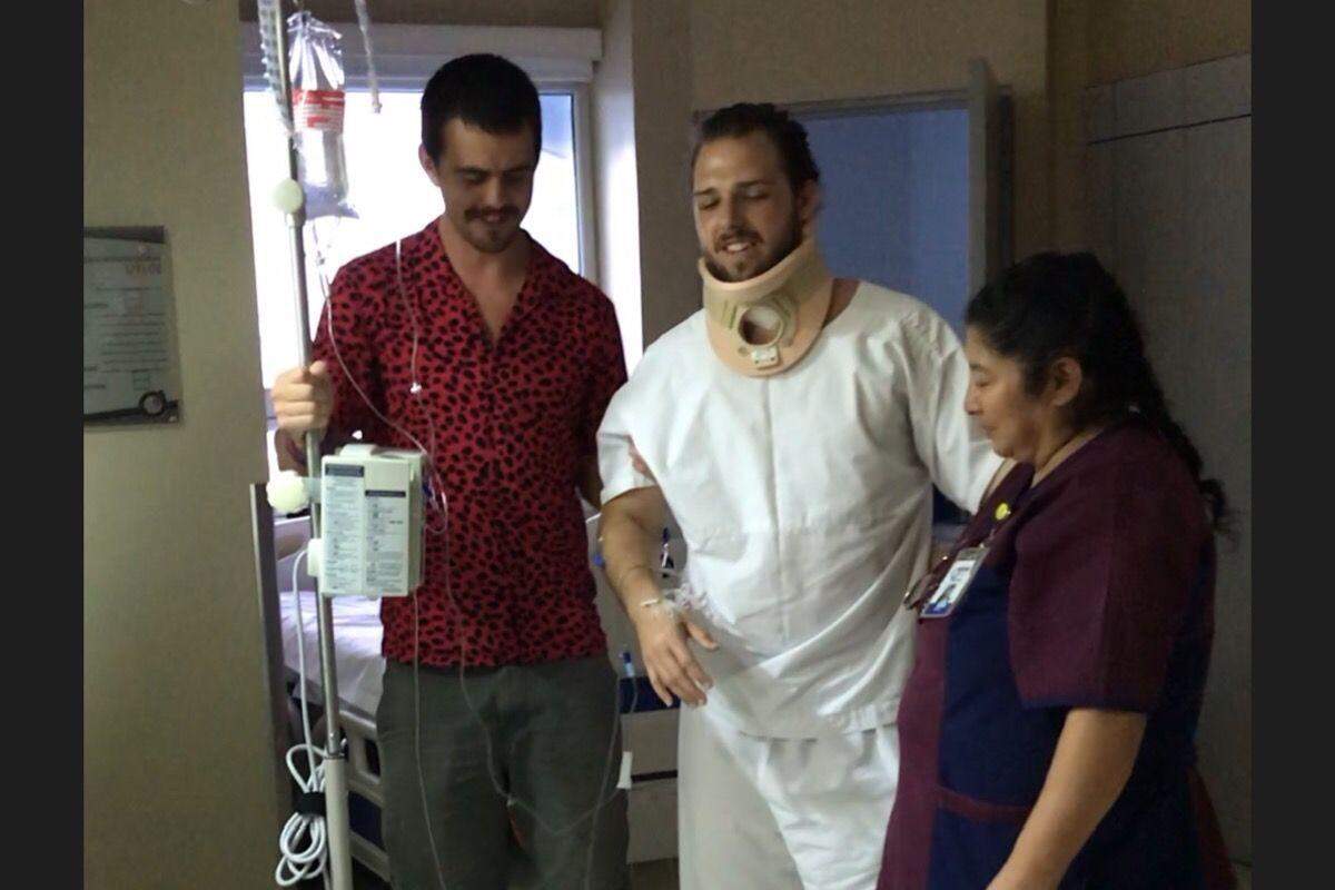 Dillon Nicholson has been a steady, supportive presence to longtime friend Alexander Austin as he recovers from a broken neck suffered when he dove into shallow water on the Guatemalan coast on Jan. 2. The two are 2008 graduates of Beyer High.