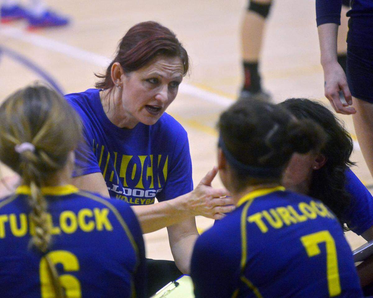 Turlock head coach Amber Lugo talks to her team during the Division I CIF San Joaquin Section Volleyball Tournament between Turlock High and Pitman High at Tokey High School in Lodi  California on November 12, 2016.