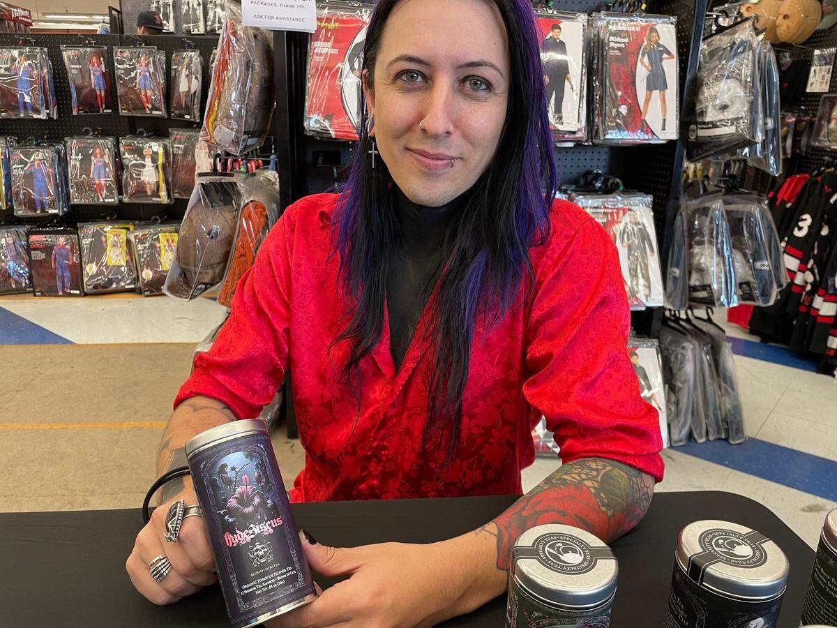 Social media personality Hyde, real name Joseph Zuzula, with his tea brand BloodThirsTea in the Hydebiscus flavor at a signing and sales event at Spirit Halloween Store on McHenry Ave. in Modesto on Saturday, Oct. 19, 2024.