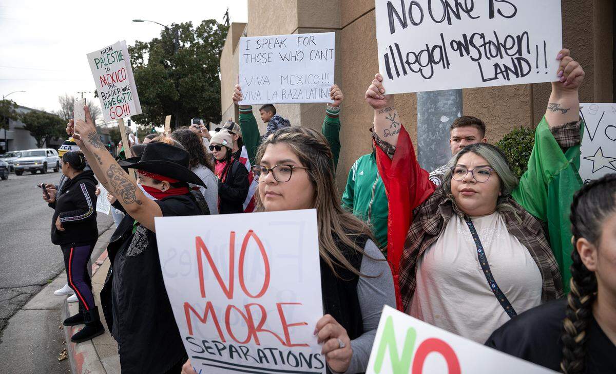 A few hundred people rallied at Five Points intersection to support immigrant rights in downtown Modesto, Monday, Feb. 3, 2025.