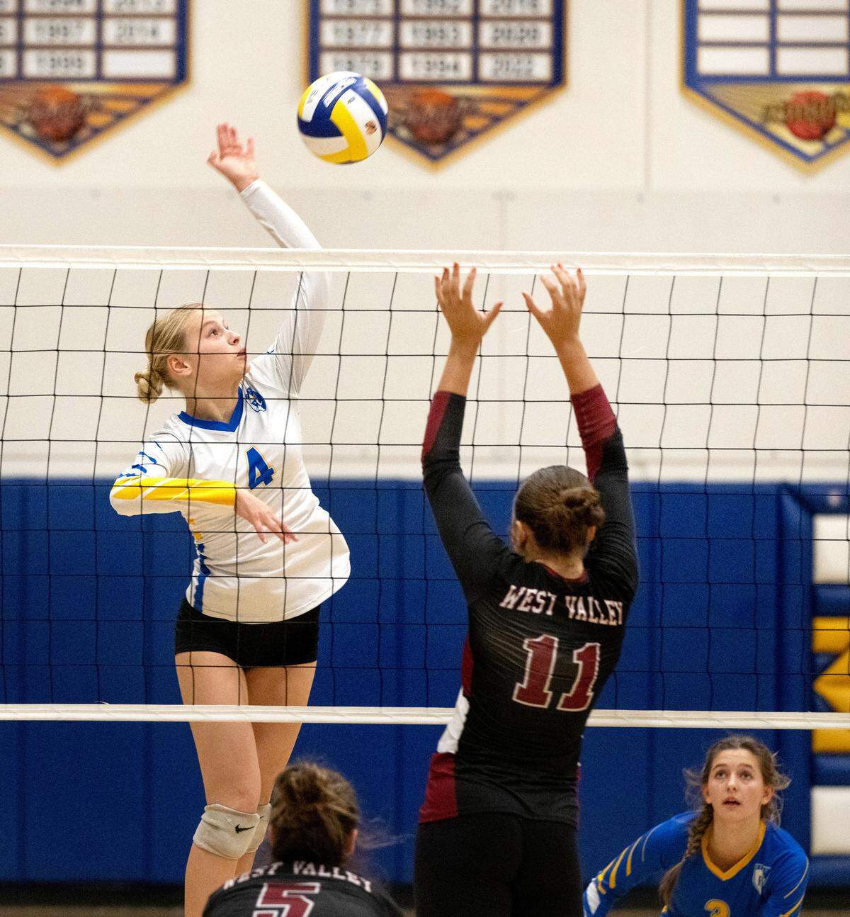 Ripon Christian’s Alyssa Hofman spikes the ball past West Valley defender Rainessa Matthews during the CIF State Division 4 playoff game at Ripon Christian High School in Ripon, Tuesday, Nov. 12, 2024.
