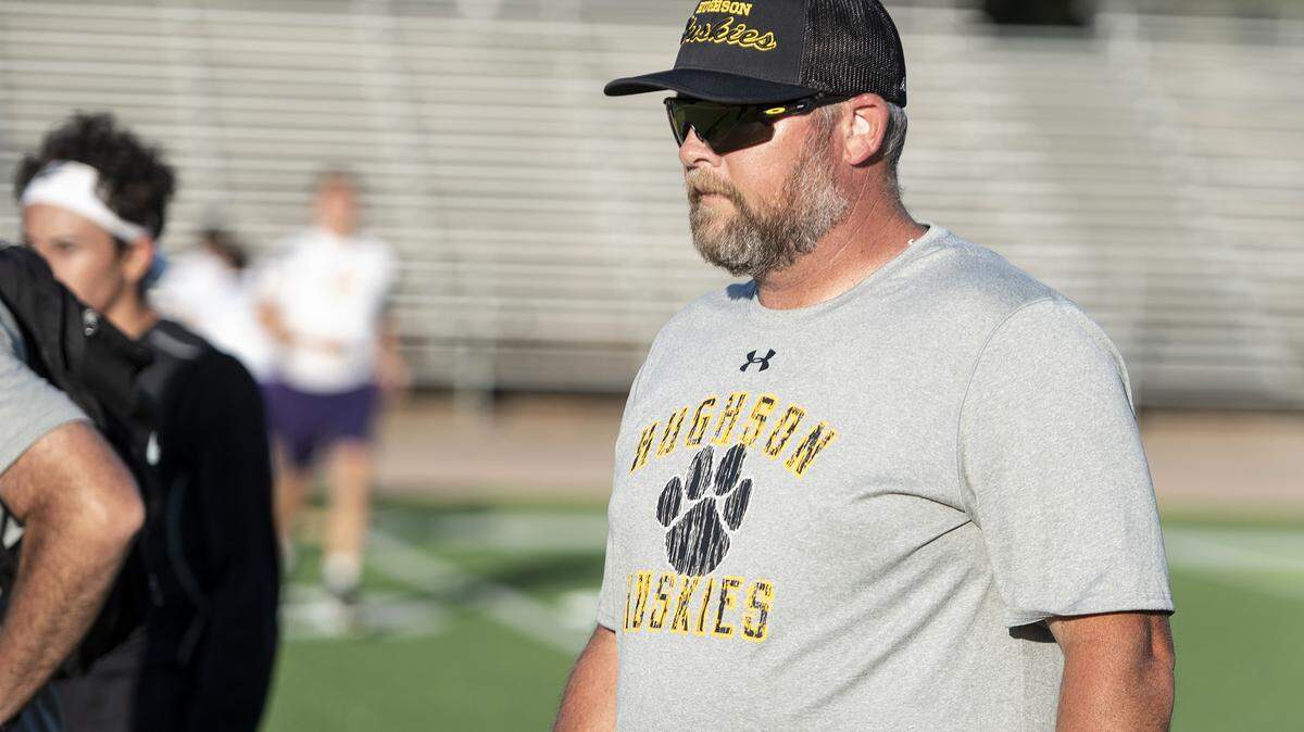 Hughson coach Shaun King watches the action during the Friday Knights Lights passing tournament at Downey High School in Modesto, Calif., Friday, June 29, 2019.