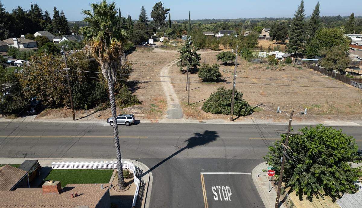 Site of proposed tiny homes project in Riverbank, Calif., Wednesday, Sept. 25, 2024. The project is seen from Stanislaus Street. The Riverbank City Council has dropped a 39-unit homeless project in favor of putting a park on the site.