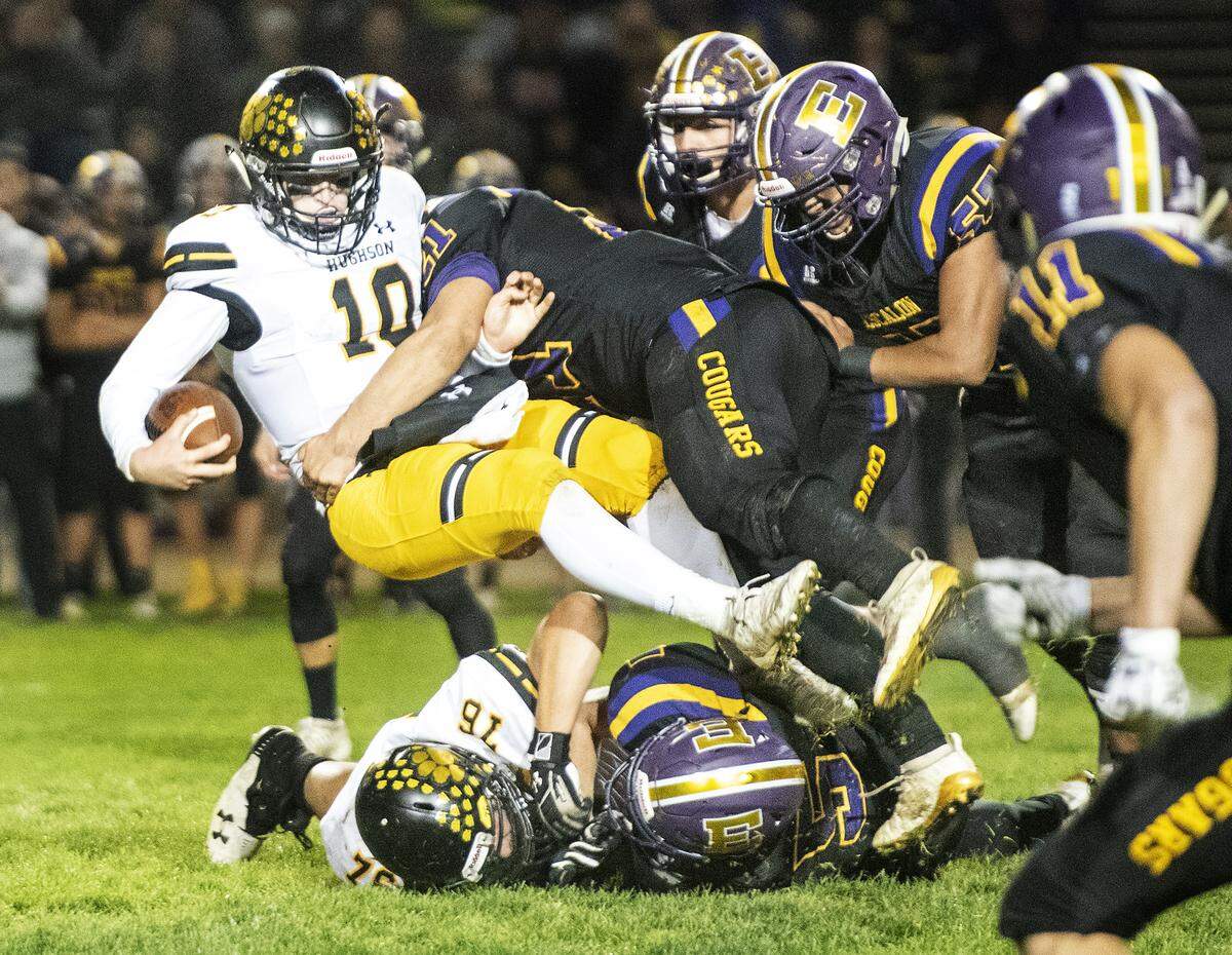 Hughson quarterback Aiden Meyer is taken down by Escalon’s Luke Anderson in the CIF Sac-Joaquin Section Division VI Quarterfinals at Escalon High School in Escalon, Calif., Friday, Nov. 15, 2019. Escalon won the game 21-6.