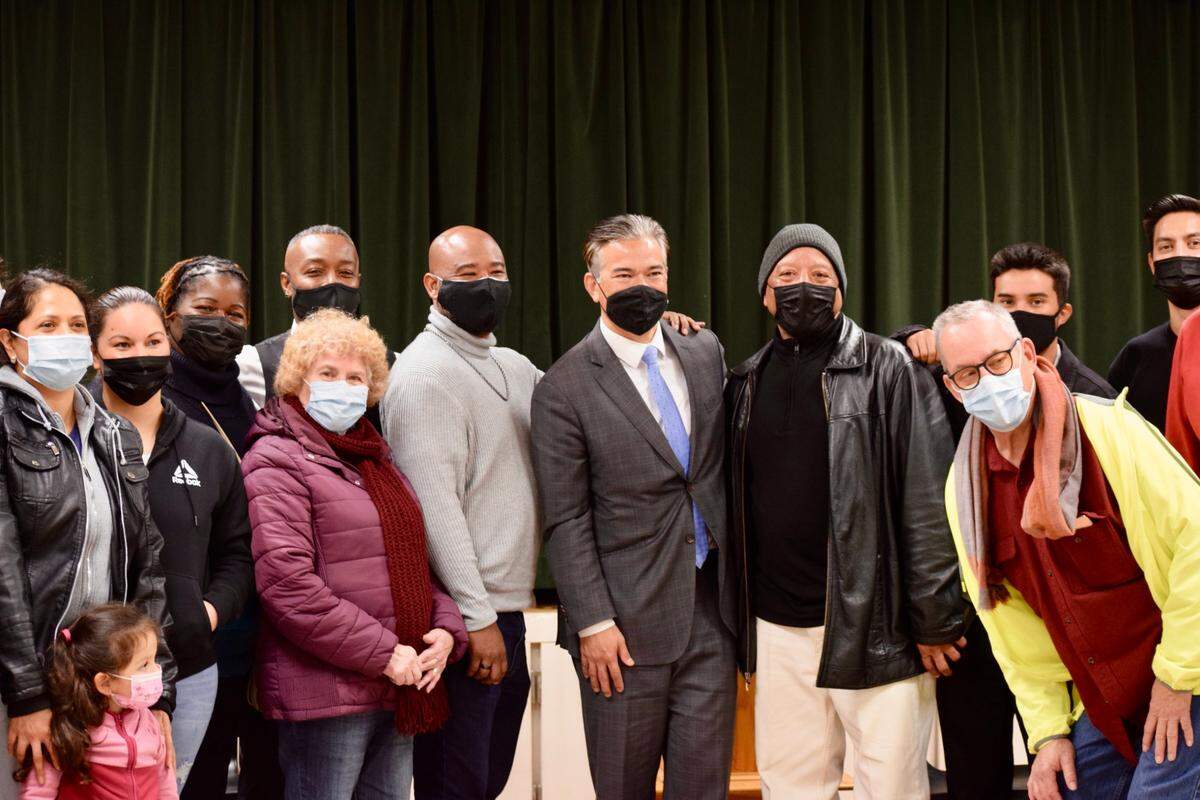 California Attorney General Rob Bonta and community members pose after a roundtable conversation at King-Kennedy Memorial Center in southwest Modesto on Dec. 13, 2021.