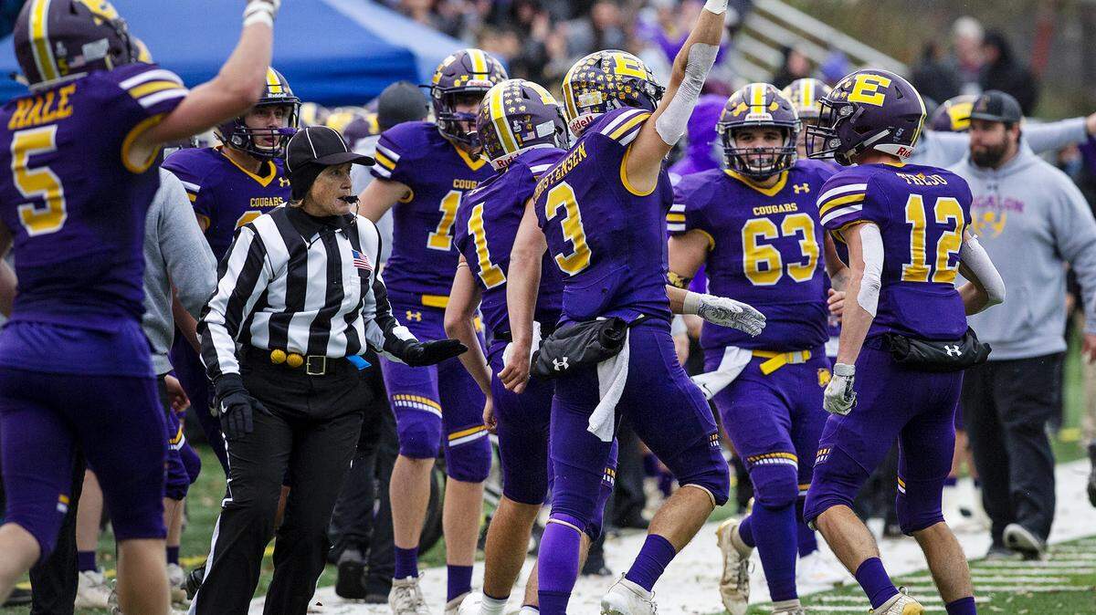 Escalon’s Kaden Christensen holds up the ball after an inception during the Sac-Joaquin Section Division 6 title game at Lincoln High School in Stockton, Calif., Saturday, Nov. 30, 2019.