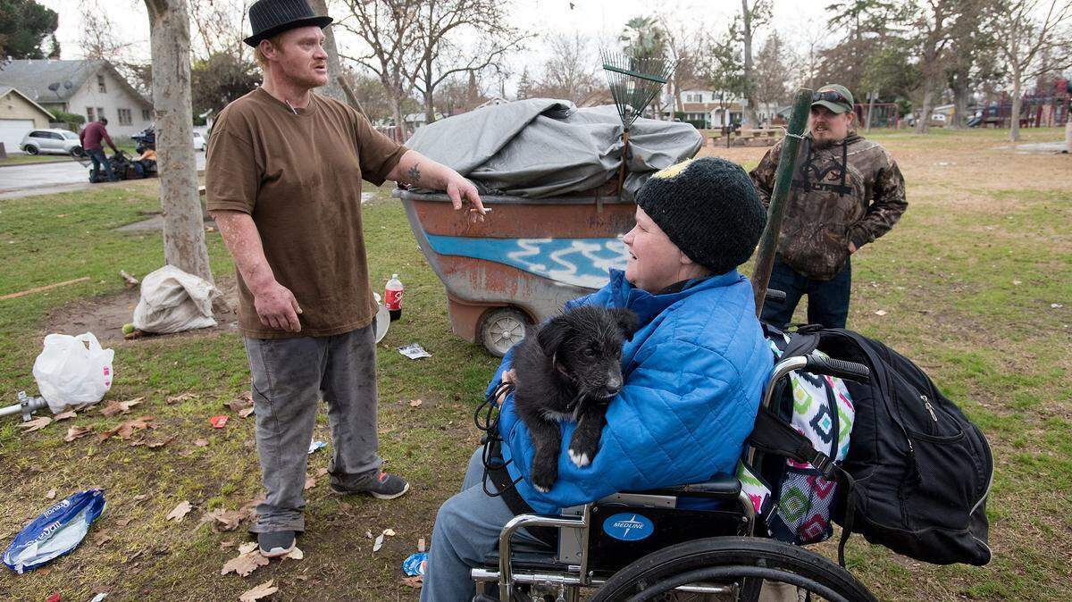 This photo was taken in early January after Modesto city crews cleared Broadway Park of homeless camps. Danny Cox, left, Shauntae Moore, front, and Derek Moore, right, said at the time they didn’t know where they would go.