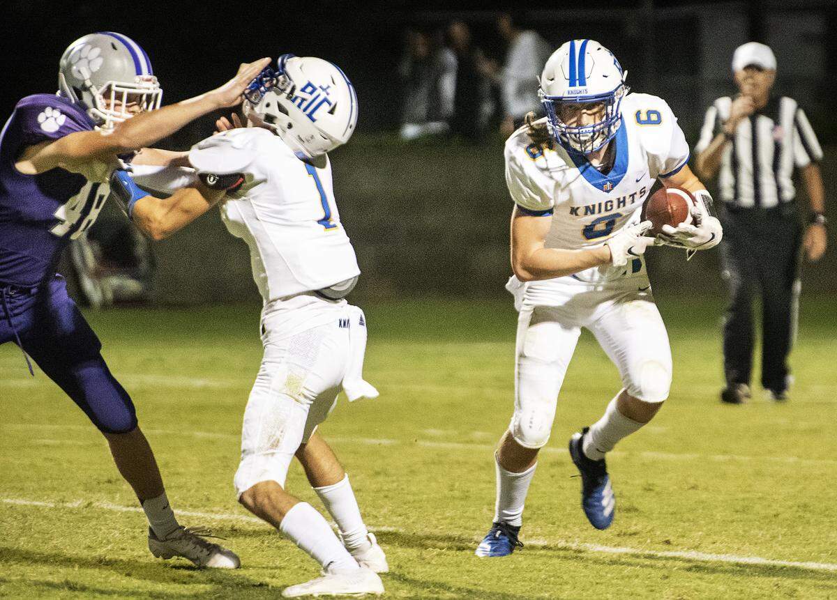 Ripon Christian’s Sean McGovern runs the ball during the Southern League game with Denair at Ripon Christian High School in Ripon, Calif., Friday, Sept. 27, 2019. Ripon Christian won the game 28-7.