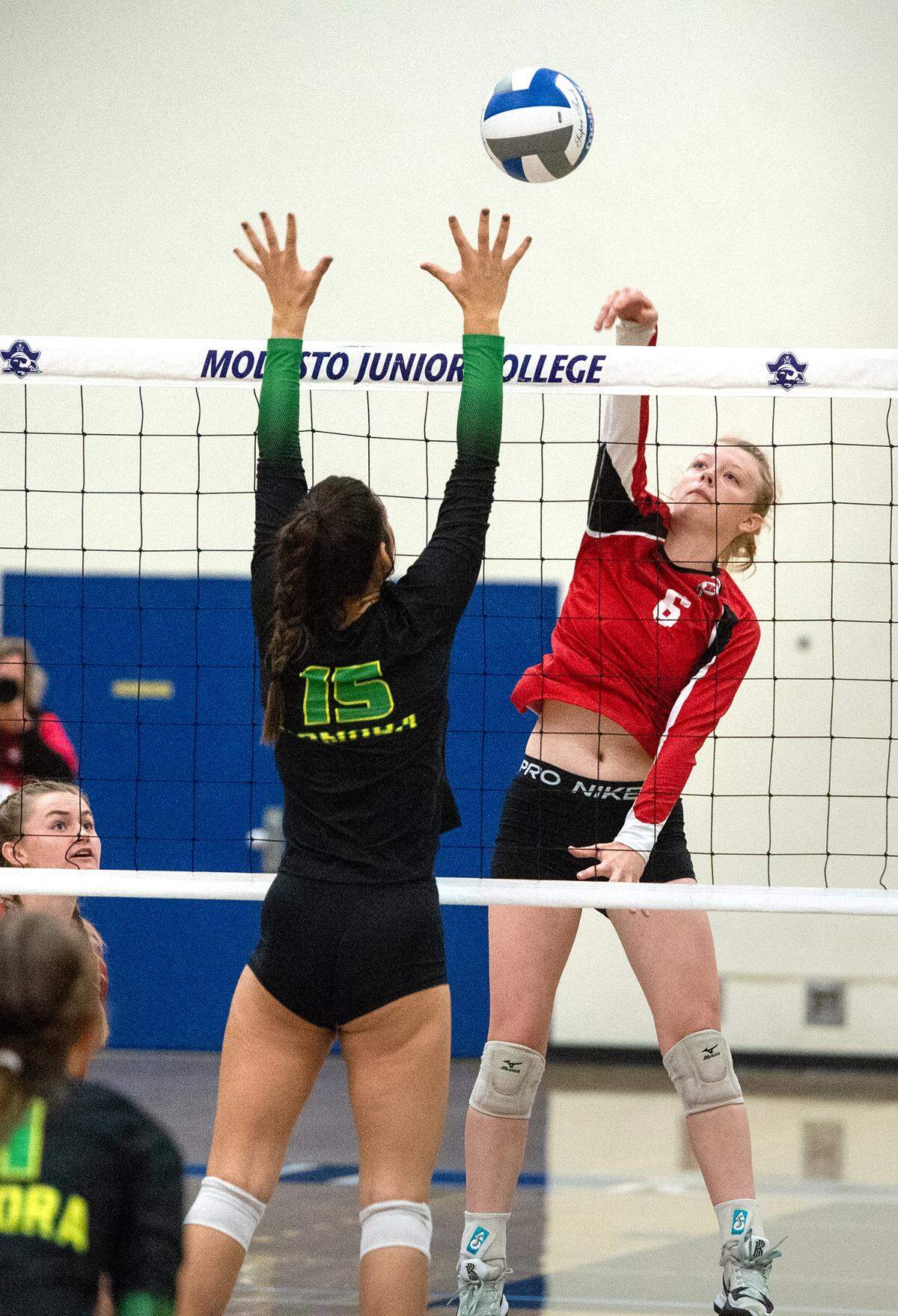 Ripon’s Katherine Eskes (6) spikes the ball past Sonora’s Mia Alomia during the Sac-Joaquin Section Division 4 Section final at Modesto Junior College in Modesto, Calif., Saturday, Nov. 5, 2022. Ripon won the title 3-1.