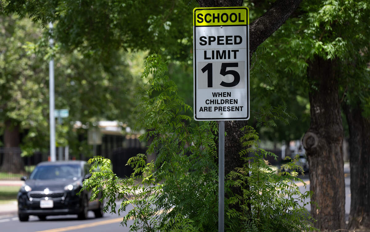 A street sign shows new speed limit outside Grace Davis High School in Modesto, Friday, June 26, 2026